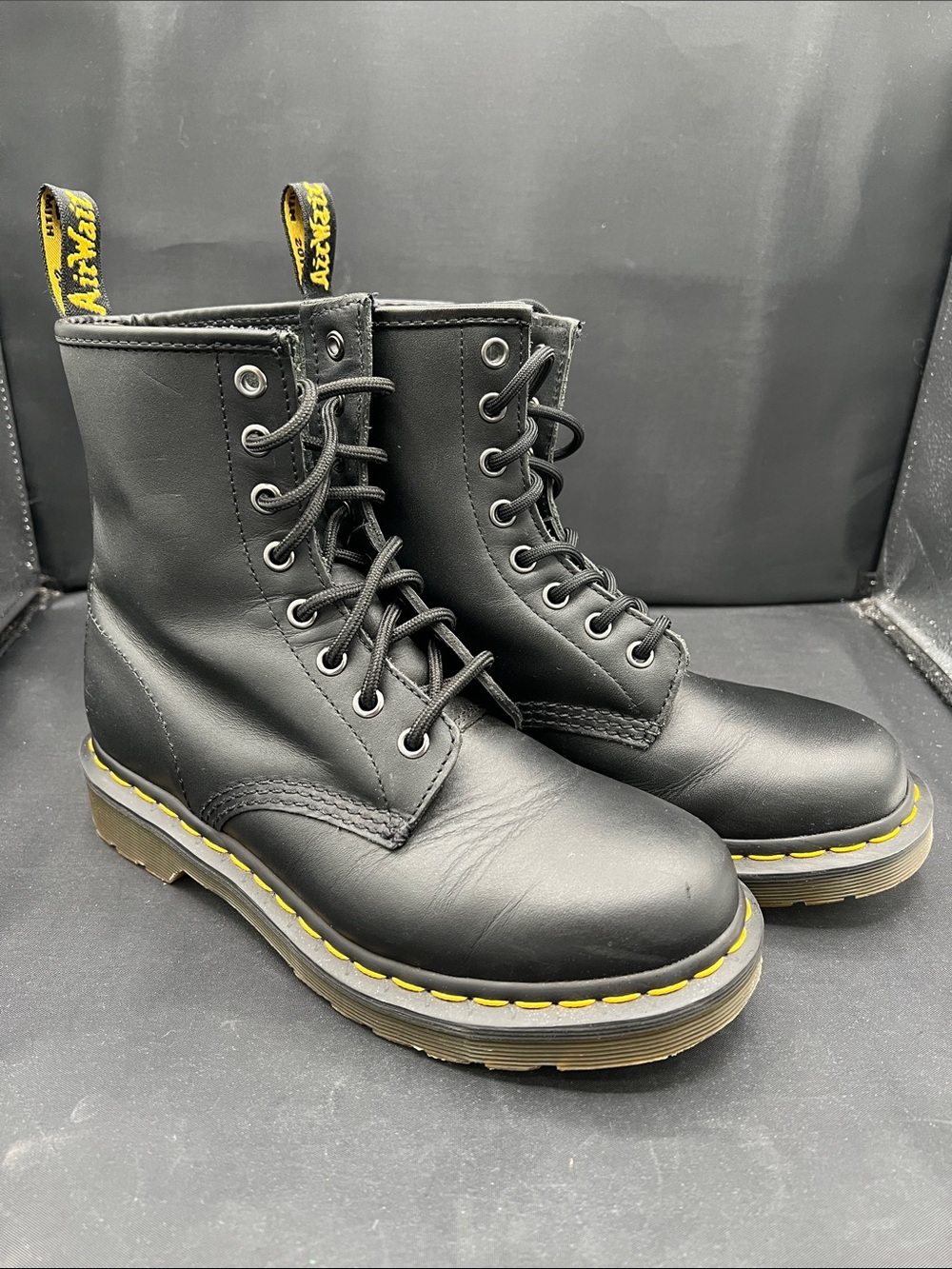Dr. Martens Black Leather 8-Eye Lace-Up Boots with Yellow Accent